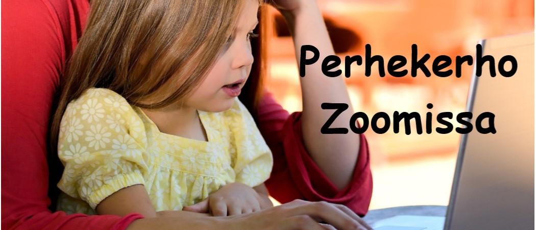 Lapsi katsoo vanhemman kanssa tietokonetta