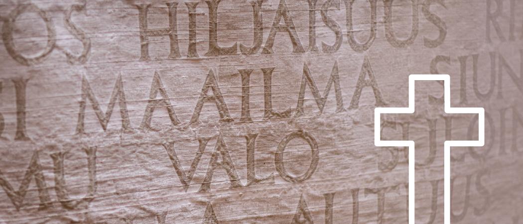 Huopalahden kirkon alttaritekstiili, jossa sanat: maailma, valo.