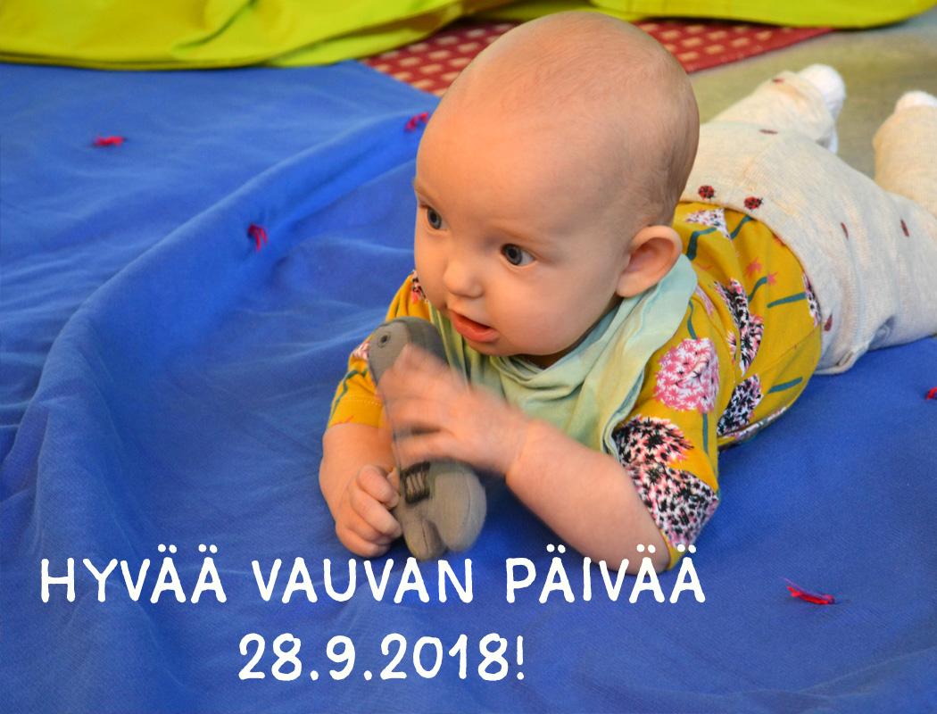vauva leikkimatolla ja teksti Hyvää Vauvan päivää 28.9.2018