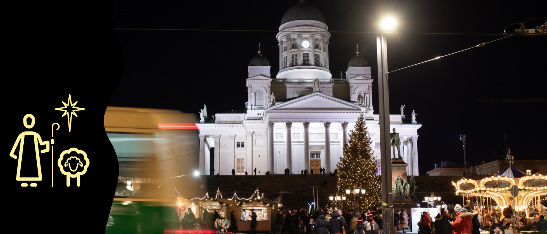Helsingn tuomiokirkko talvi-iltavalaistuksessa, kuvassa my&ouml;s joulukuusi ja ihmisi&auml;