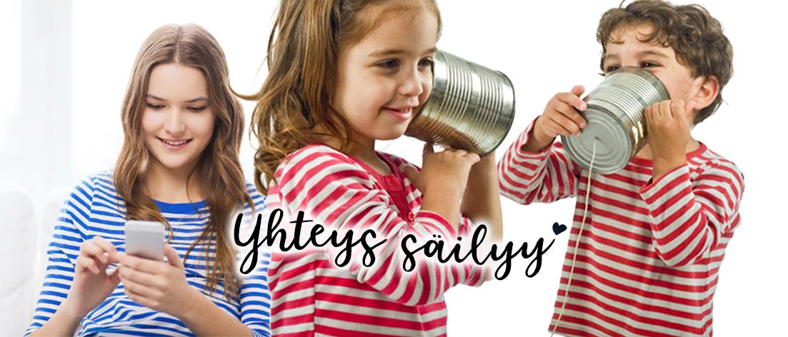 Lapset leikkivät vanhanaikaisella tölkeistä tehdyillä puhelimilla, taustalla nuori tyttö joka selaa kännykkää